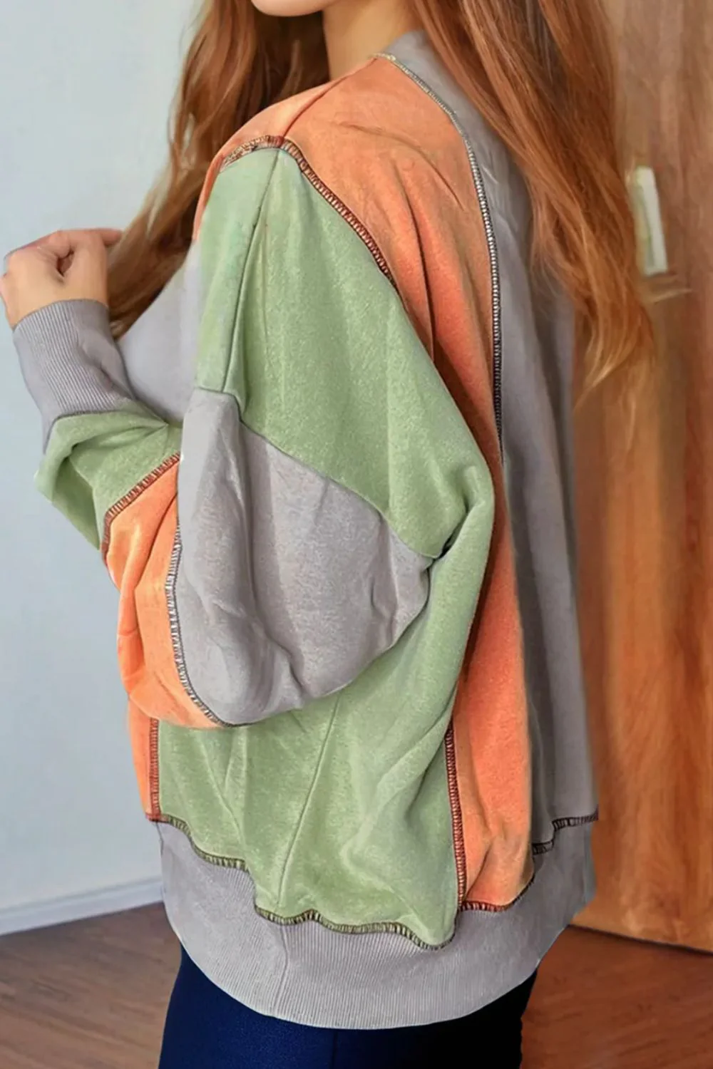 Andrea | Full size long sleeve sweatshirt with exposed seams and color block pattern - Image 2