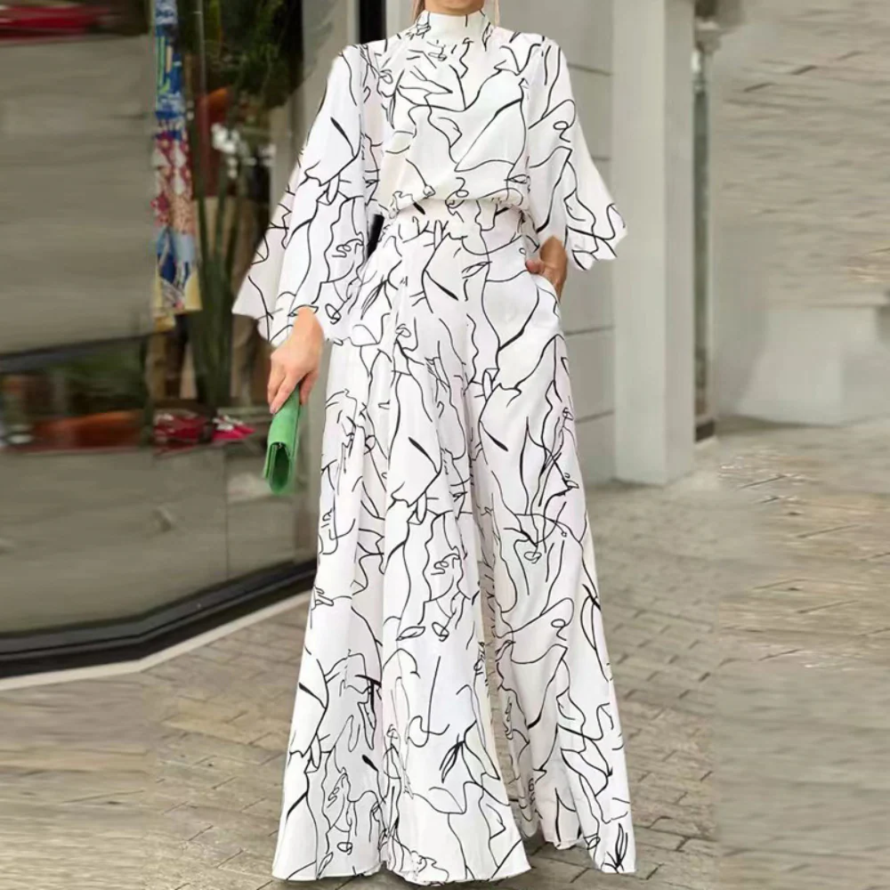Anna® | Elegant Long-Sleeved Jumpsuit With Abstract Print - Image 2
