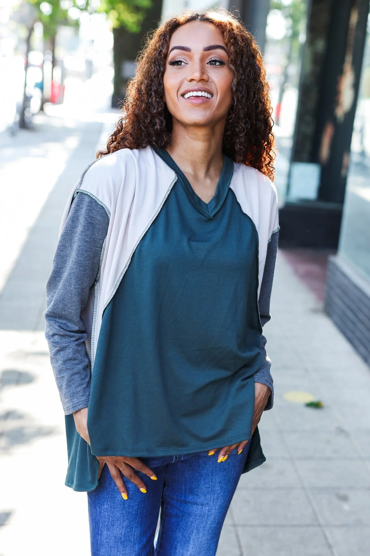 Beate | Standout hunter green raglan top with color block outseam and V-neckline - Image 15