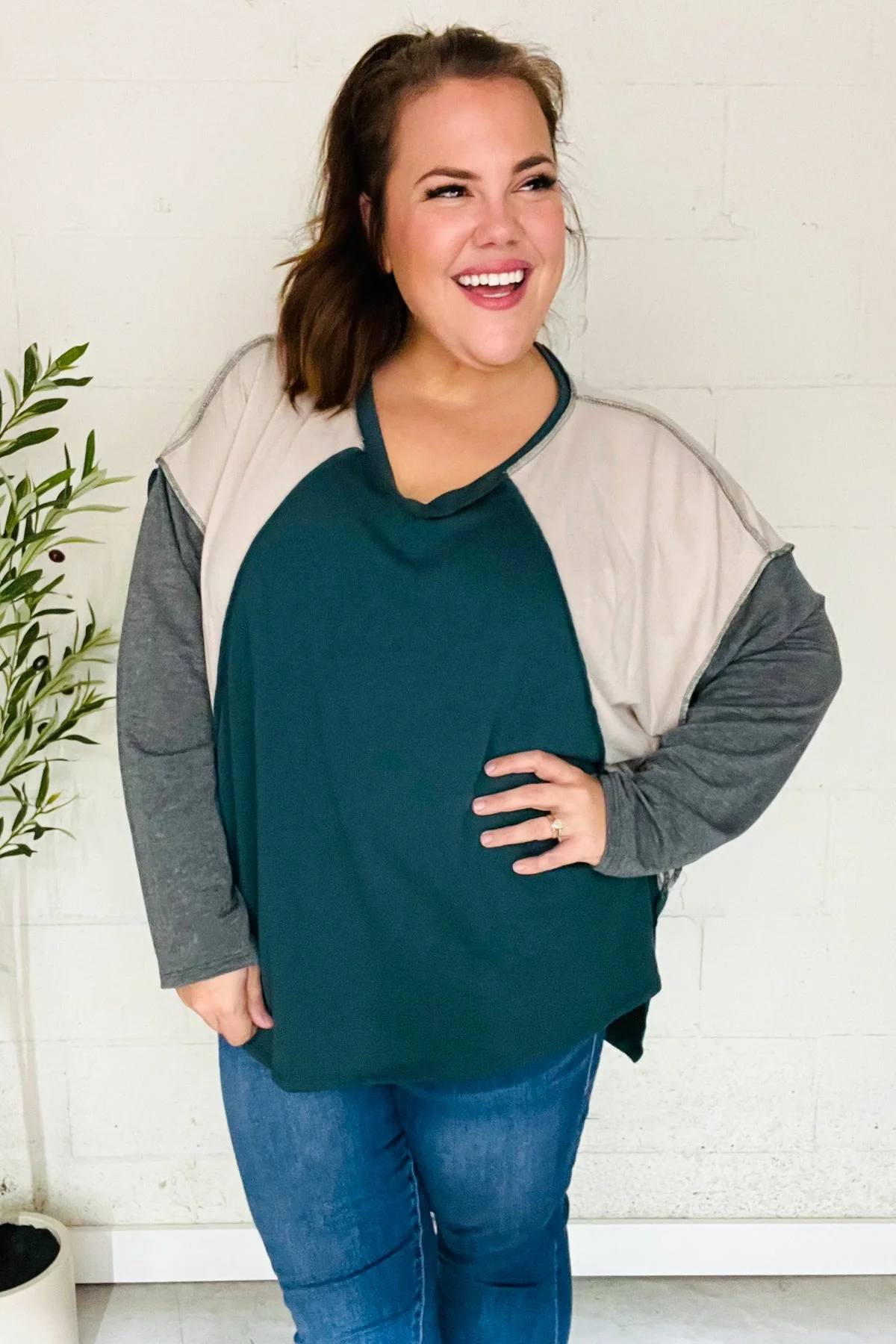 Beate | Standout hunter green raglan top with color block outseam and V-neckline - Image 2