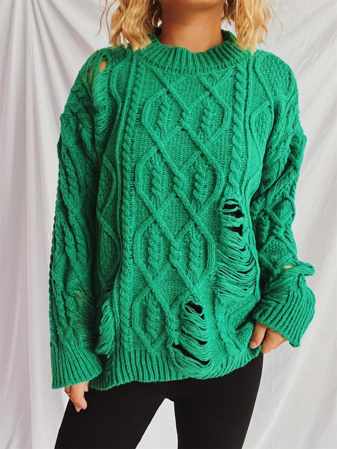 Clara | Long-sleeved, crew-neck, distressed cable-knit sweater