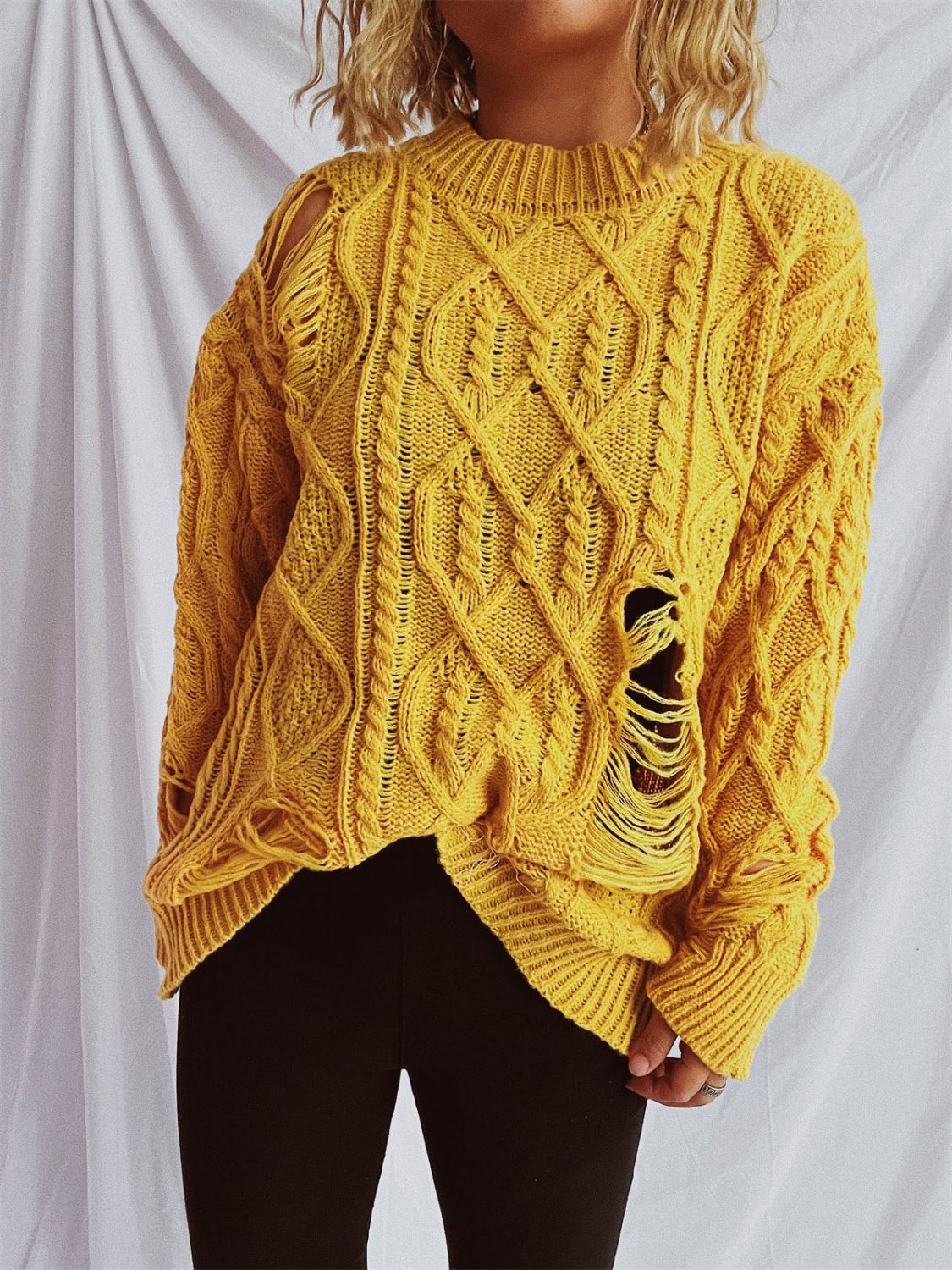 Clara | Long-sleeved, crew-neck, distressed cable-knit sweater - Image 13
