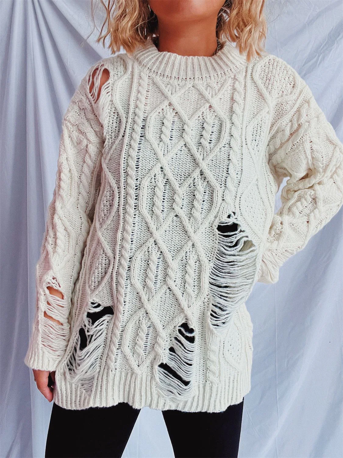 Clara | Long-sleeved, crew-neck, distressed cable-knit sweater - Image 8