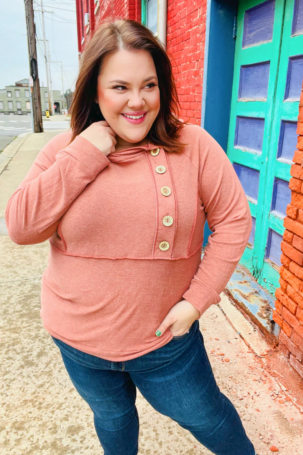 Elsa | Rust colored princess hoodie with line-out seam and button placket