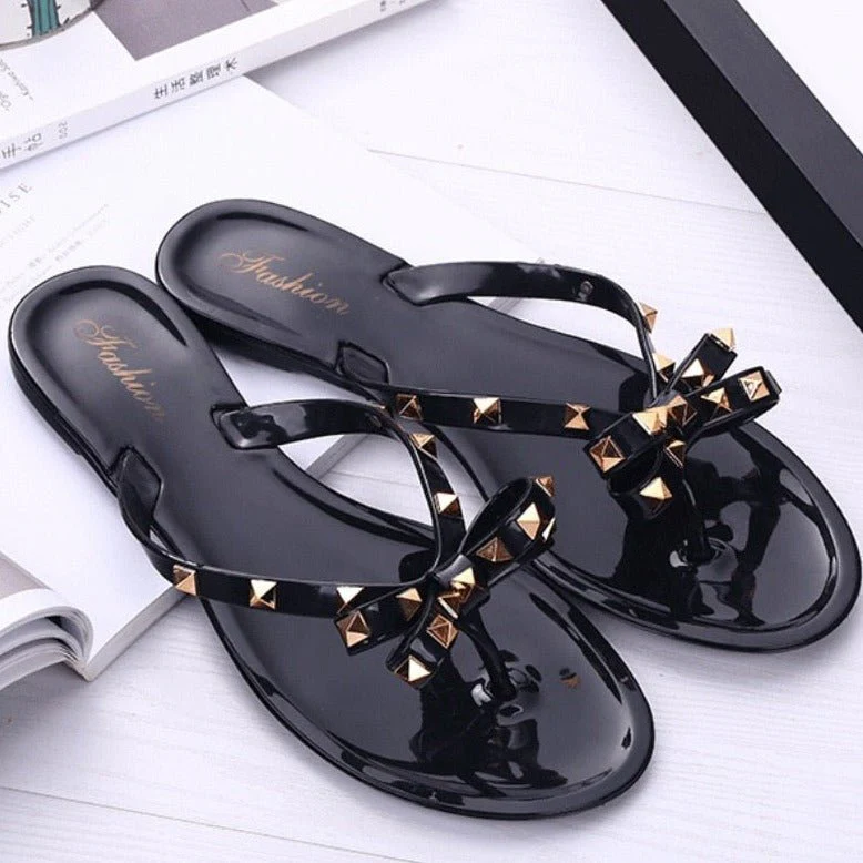 Frida® | Playful Flip-Flops With Bow Detail And Rivets