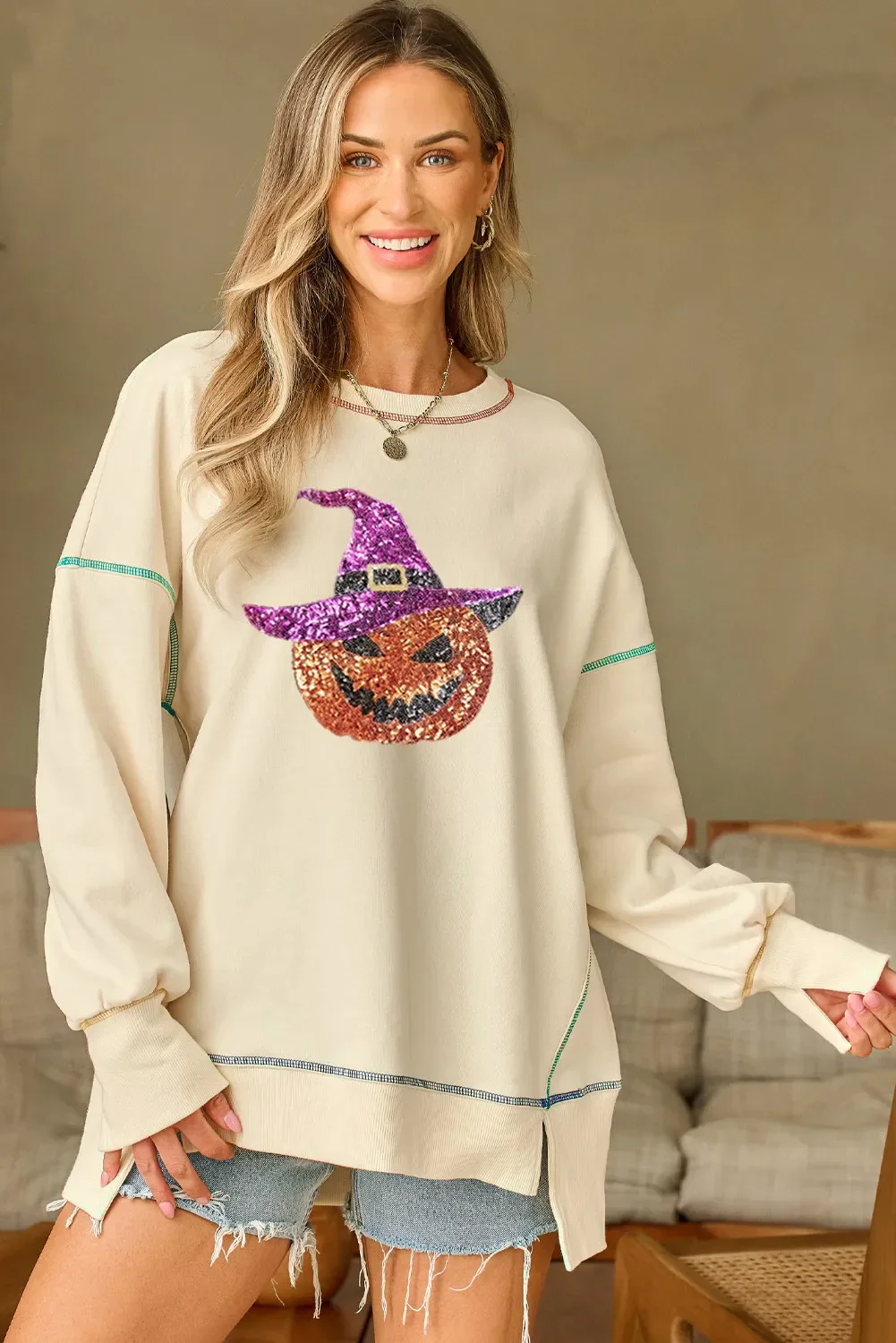 Hilda | Pumpkin crew neck long sleeve sweatshirt with sequins and contrast stitching