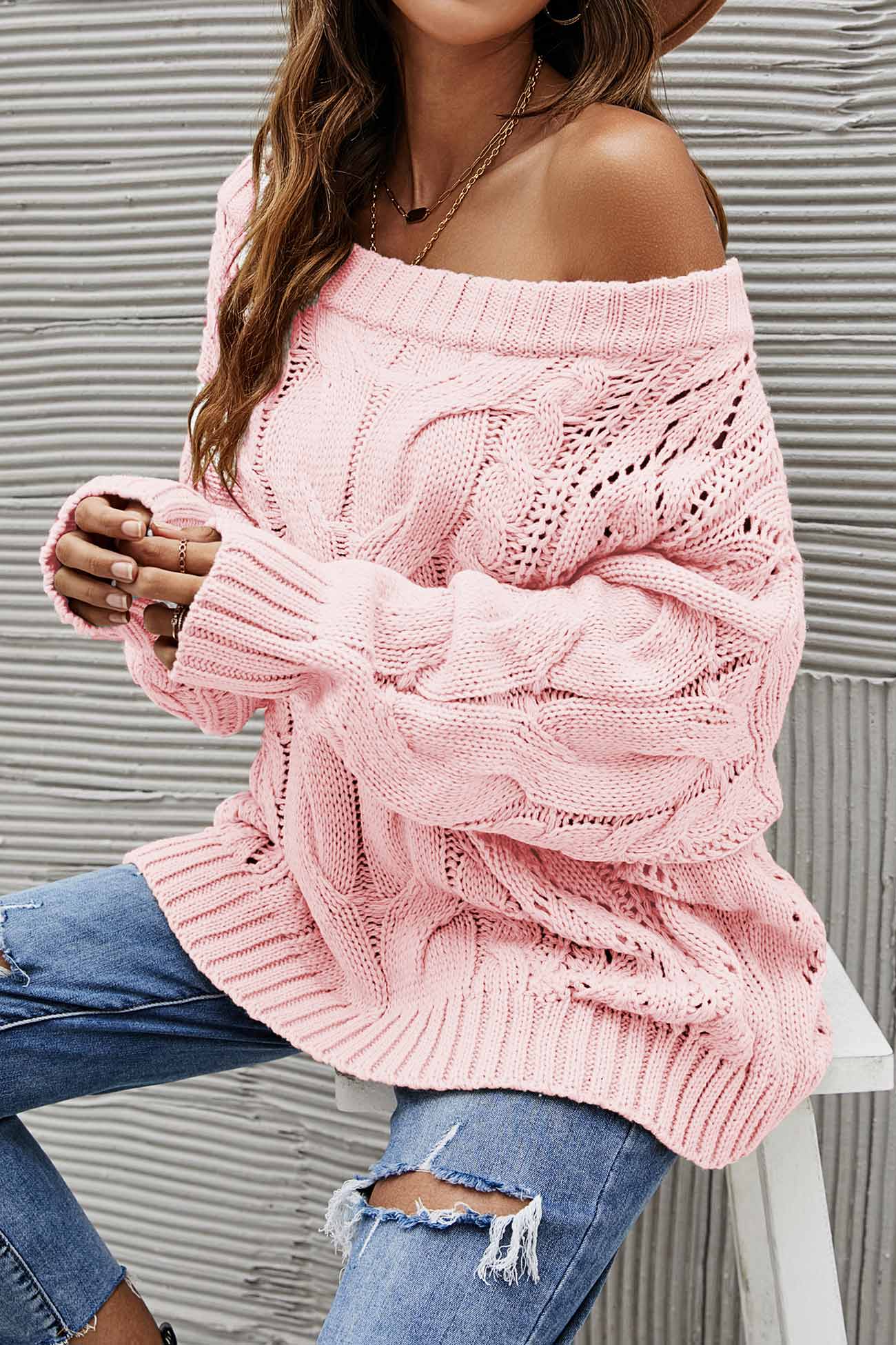 Janine | Knitted jumper with a dropped shoulder and a hollowed-out cable pattern
