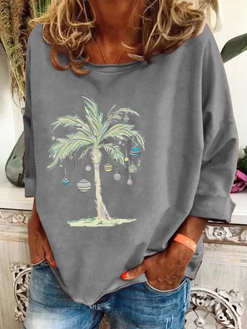 Justina | Casual coconut print Christmas top for women - Image 9