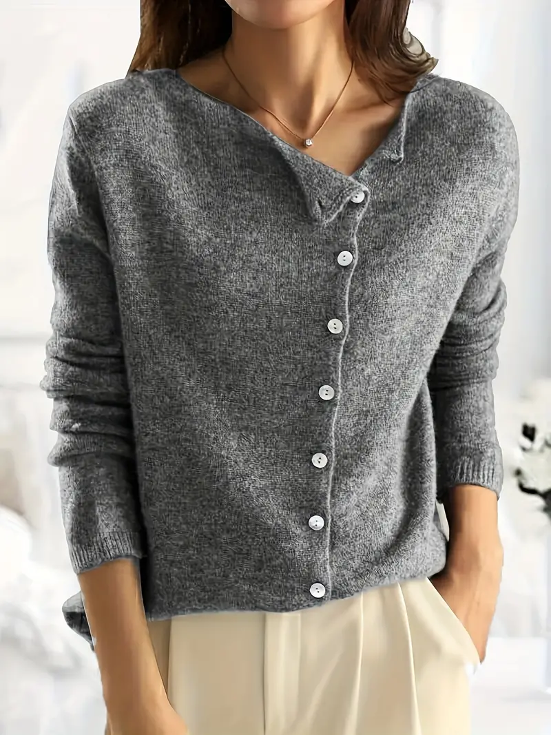 Karin | Asymmetrical, simple cardigan with button closure