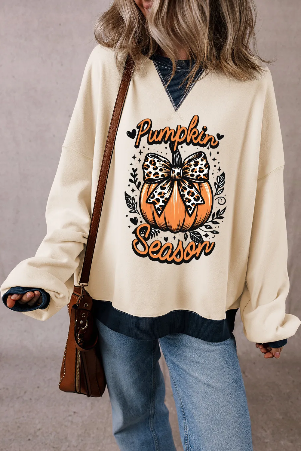 Lara | Long-sleeved sweatshirt with a pumpkin graphic