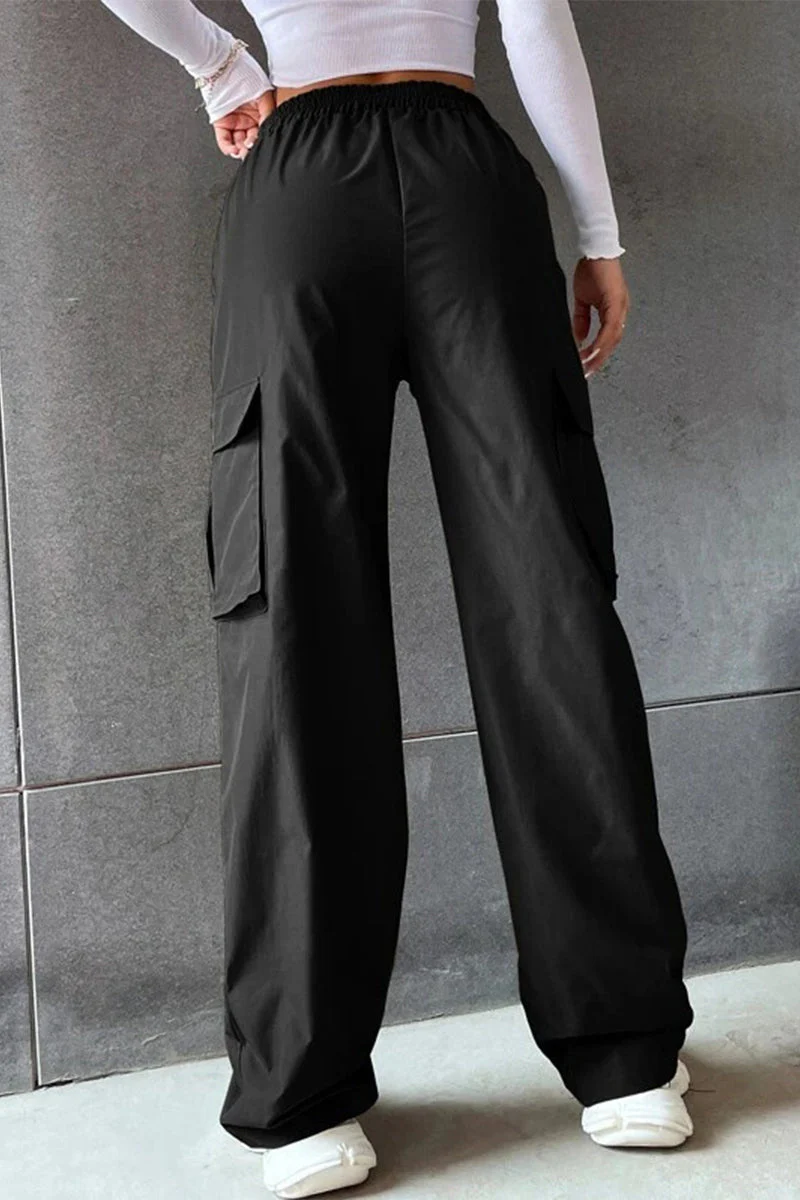 Noemí | Solid loose solid color mid waist pants with pockets - Image 2