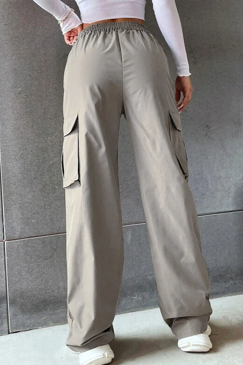 Noemí | Solid loose solid color mid waist pants with pockets - Image 8