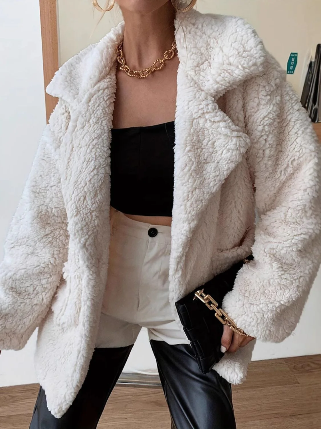 Pink | Fluffy, long-sleeved coat with an open front