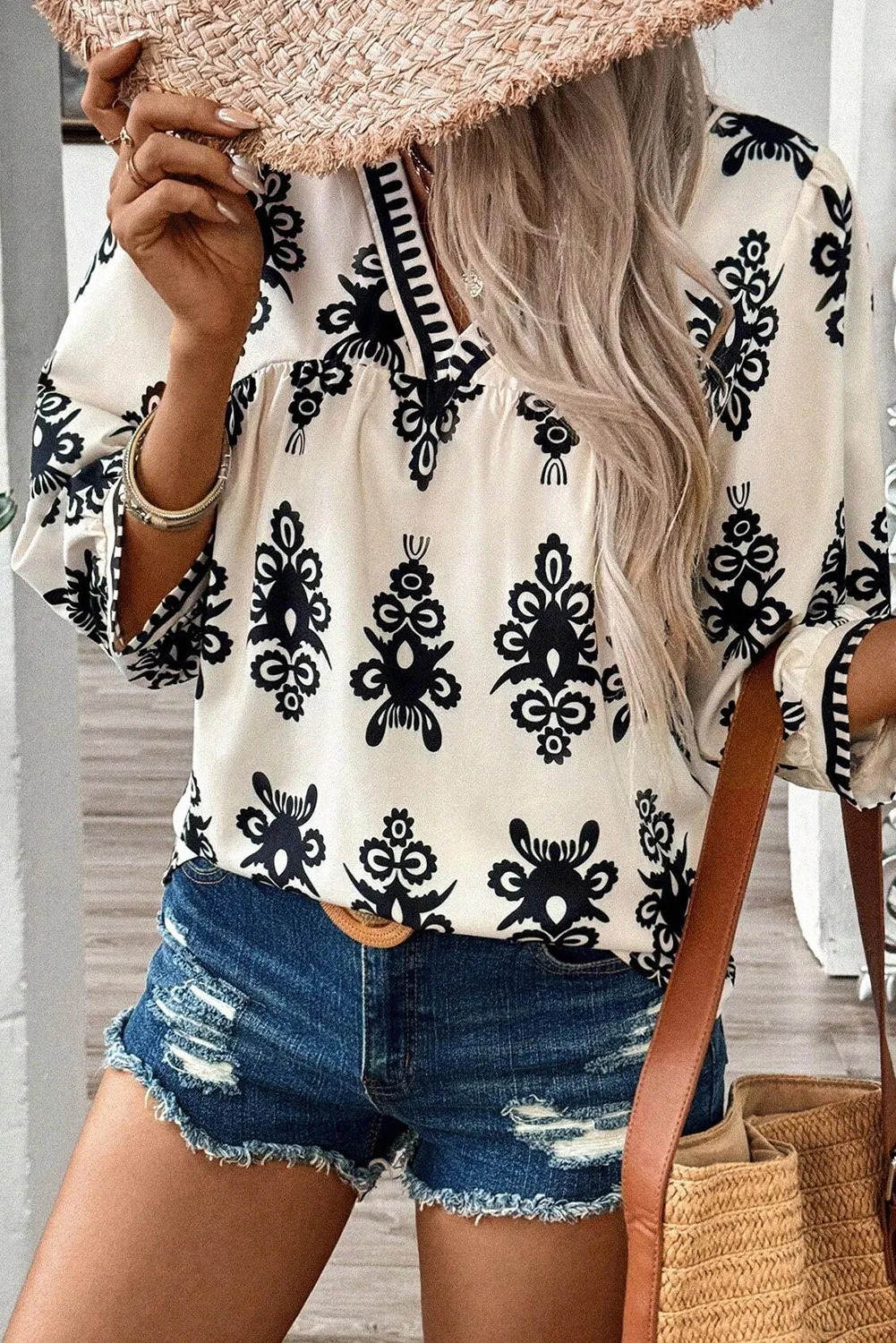 Renata | Printed blouse with three quarter sleeves and V-neck - Image 2