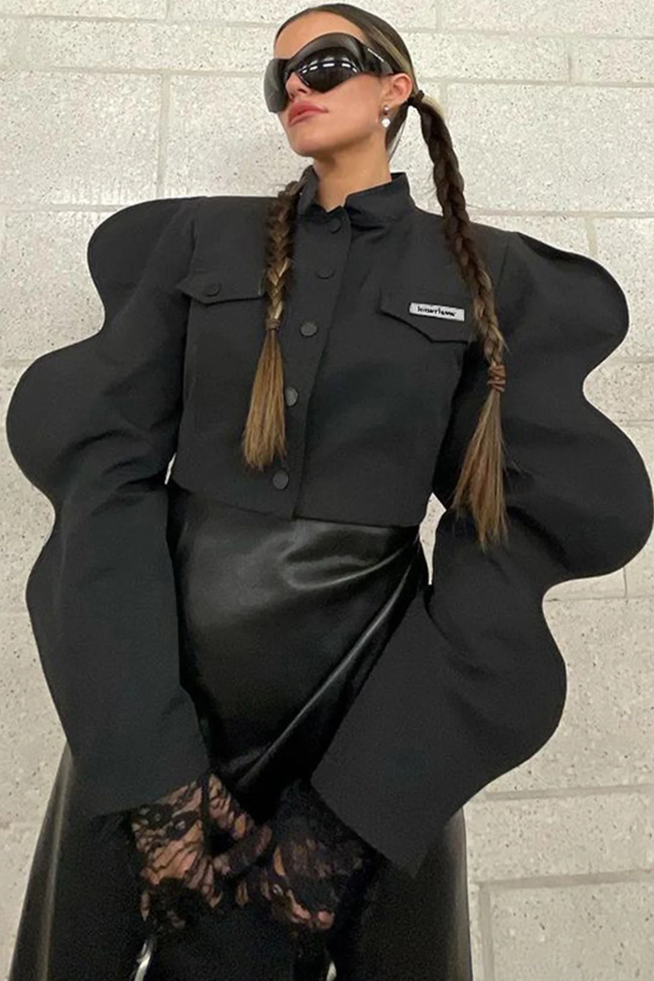 Sandra | Black coat with irregular sleeves and front lapel button