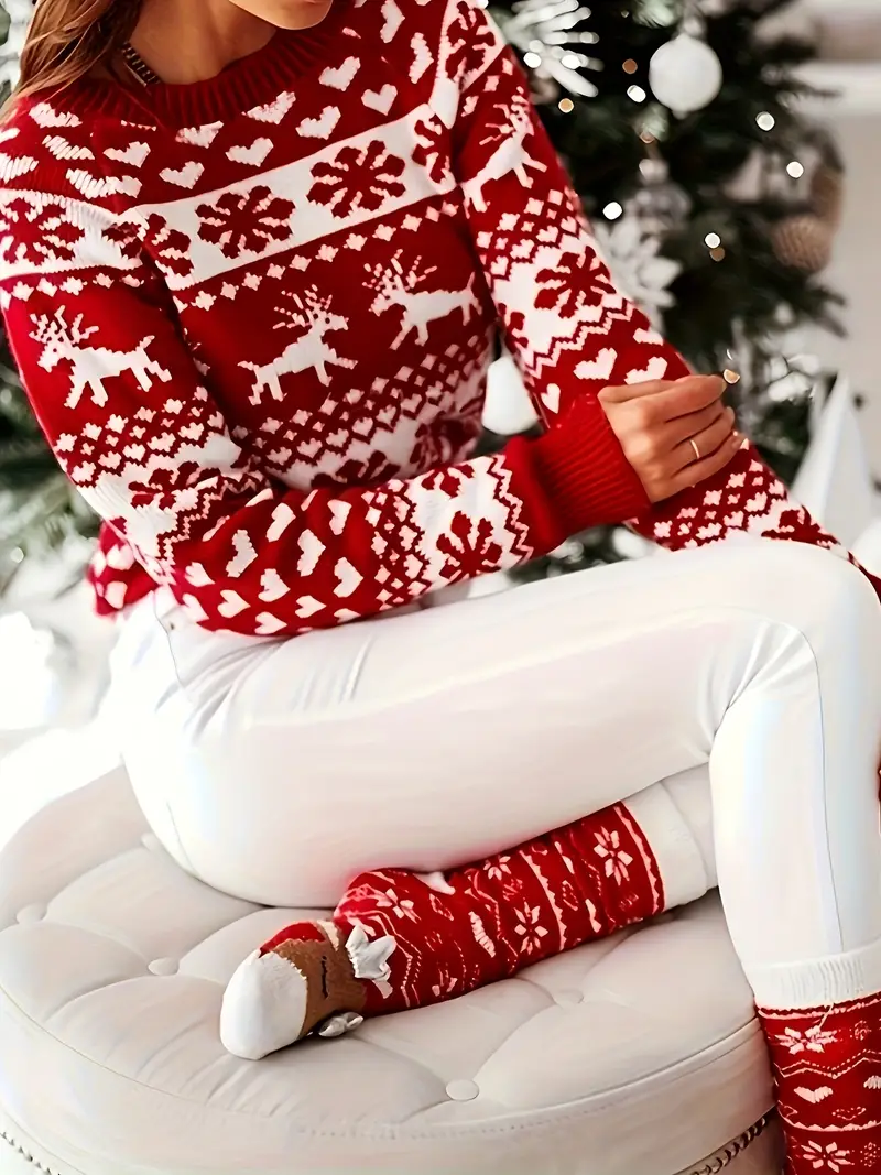Yara | Festive sweater with a reindeer and snowflake design. - Image 2
