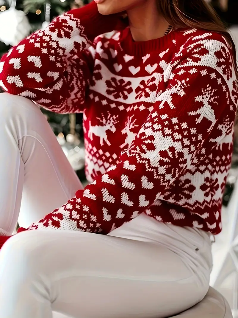 Yara | Festive sweater with a reindeer and snowflake design. - Image 5