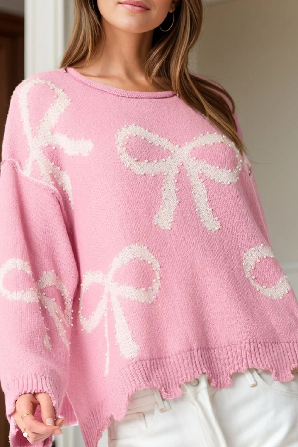 Yessica | Long-sleeved crew neck sweater with pearl detail and bow